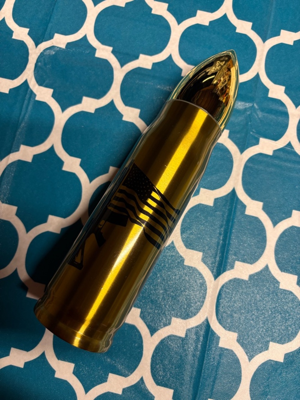 Metallic Gold Bullet-Shaped Tumbler with Black Flag Graphic
